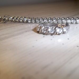 Bracelet and ring with faux diamonds.